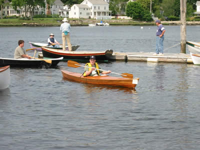 A nice lapstrake double paddled canoe